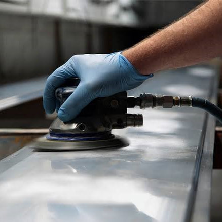 Polishing metal with sandpaper