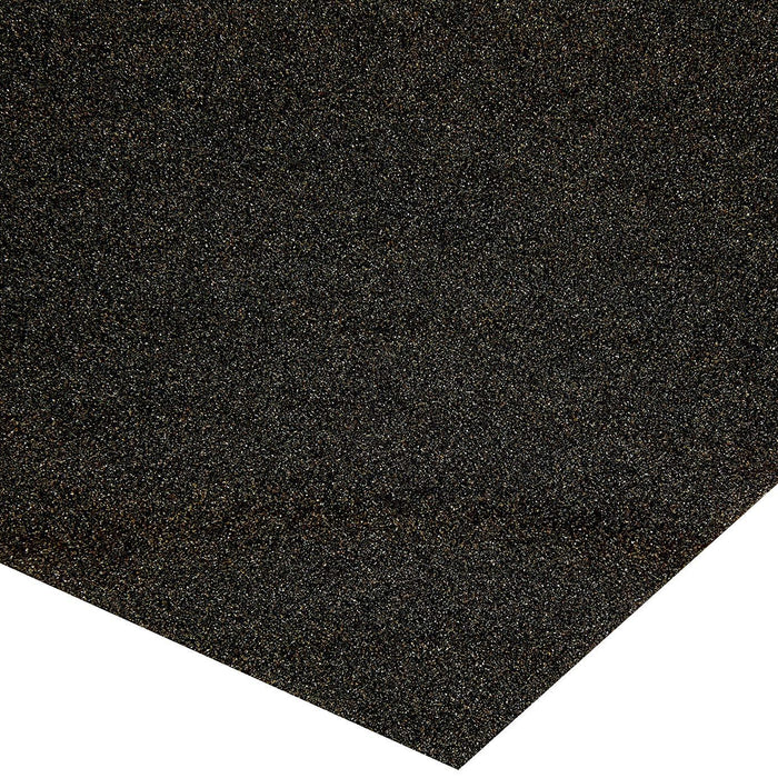 A close-up view of abrasive texture for comparing sanding scratch patterns.