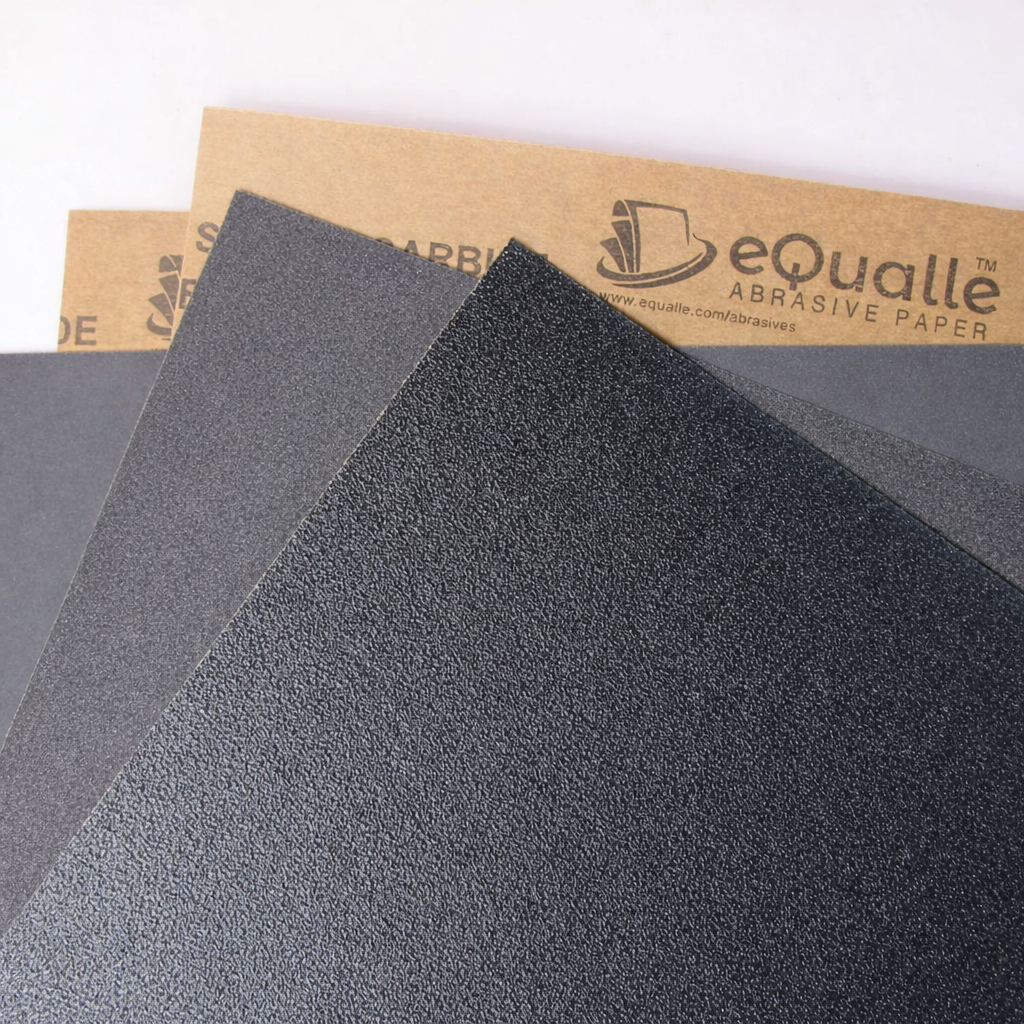 A front view of an eQualle assorted grit sandpaper kit for wet and dry sanding setup planning.